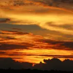 A imagem representa um por do sol no Outono na região Sudeste